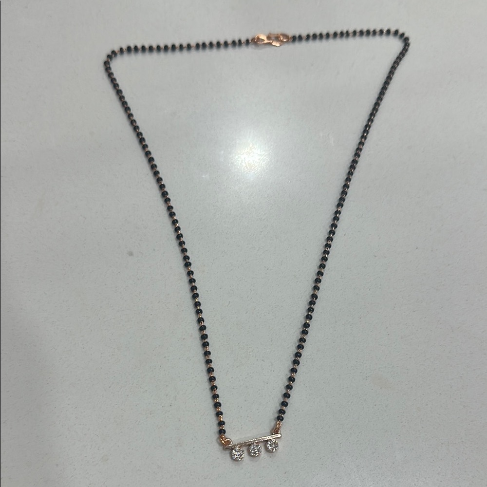 Elegant Black and Gold Necklace with Crystal Accents